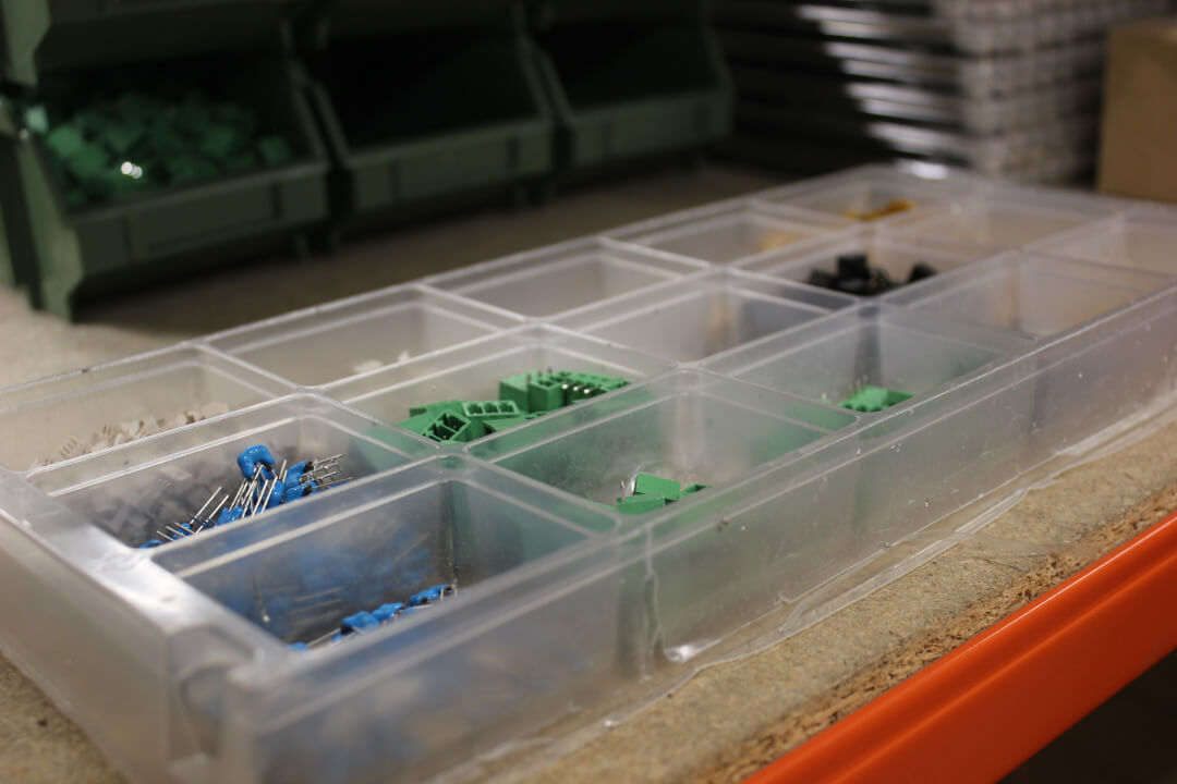 A close up of electronic components stored individually