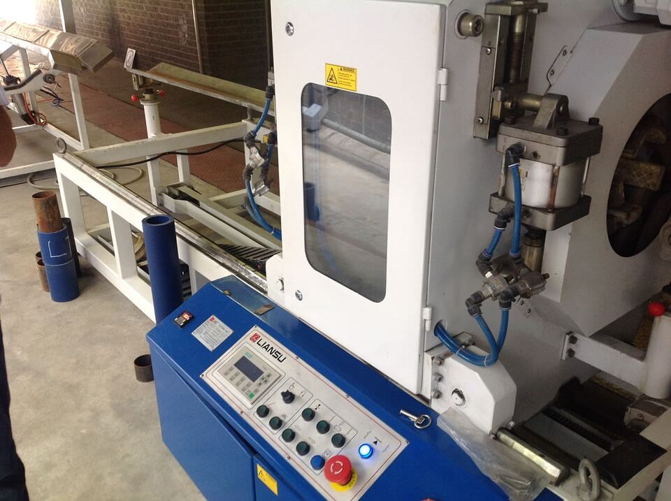 Image of a pipe extruder machine