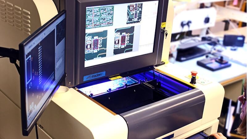 An image of a printed circuit board under going AOI checking