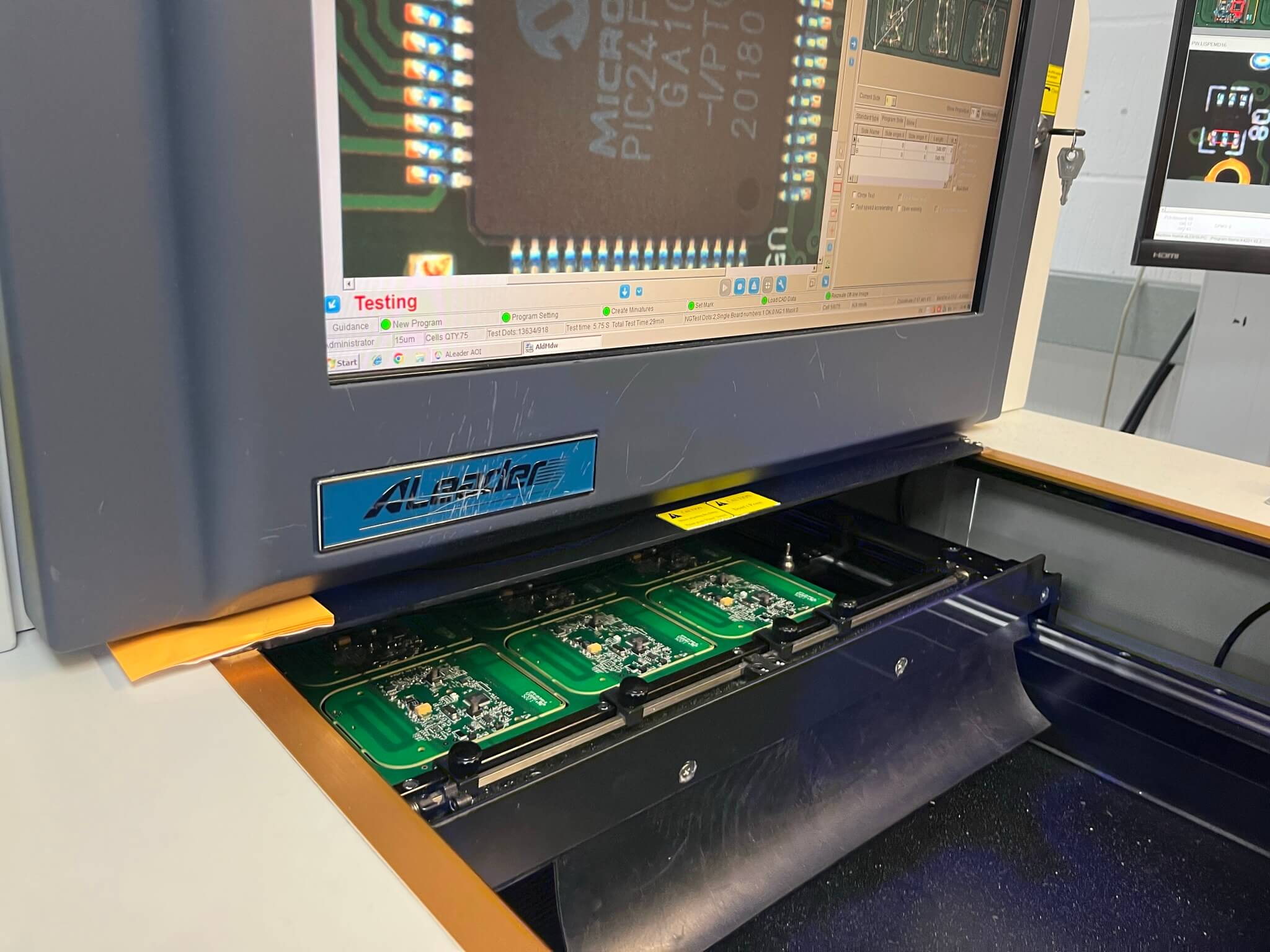 An image of a printed circuit board under going AOI checking