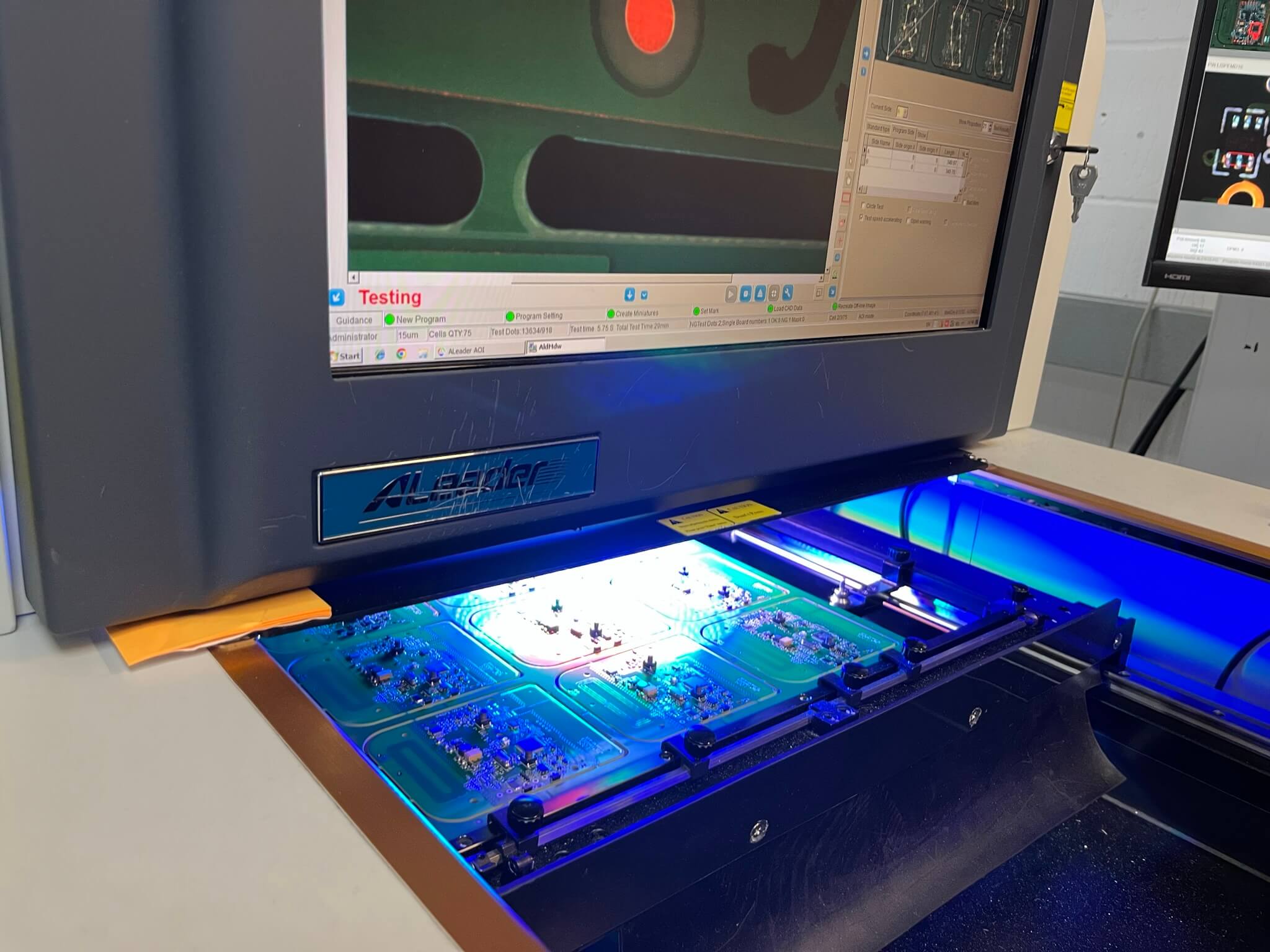 An image of a printed circuit board under going AOI checking