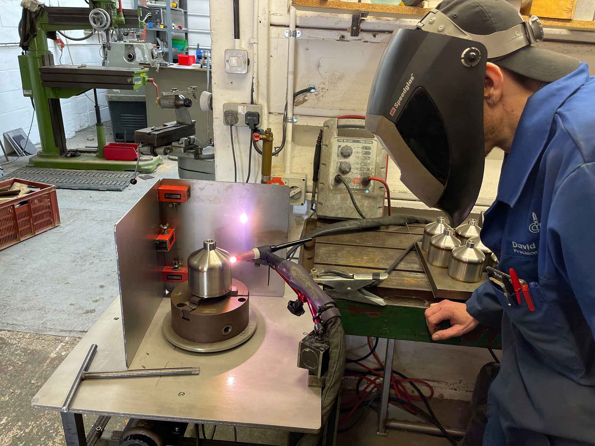 Engineer operating an automatic welder