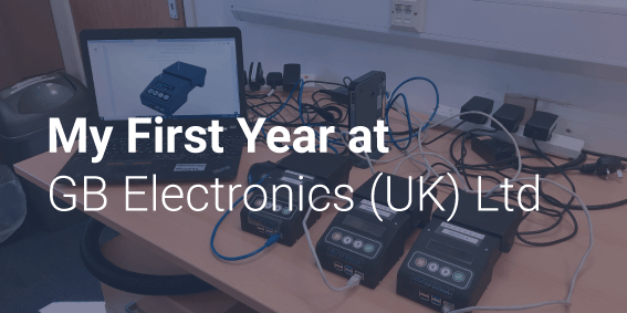 An image of a desk with a laptop and various electrical appliances with the text 'My First Year at GB Electronics (UK) Ltd' over the top.