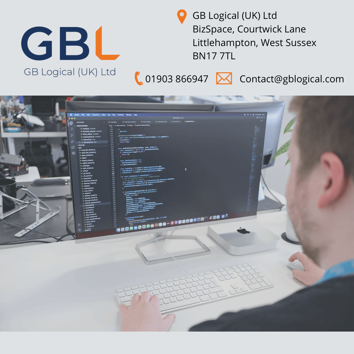 A man working at a computer monitor to help illustrate the creation of GB Logical.