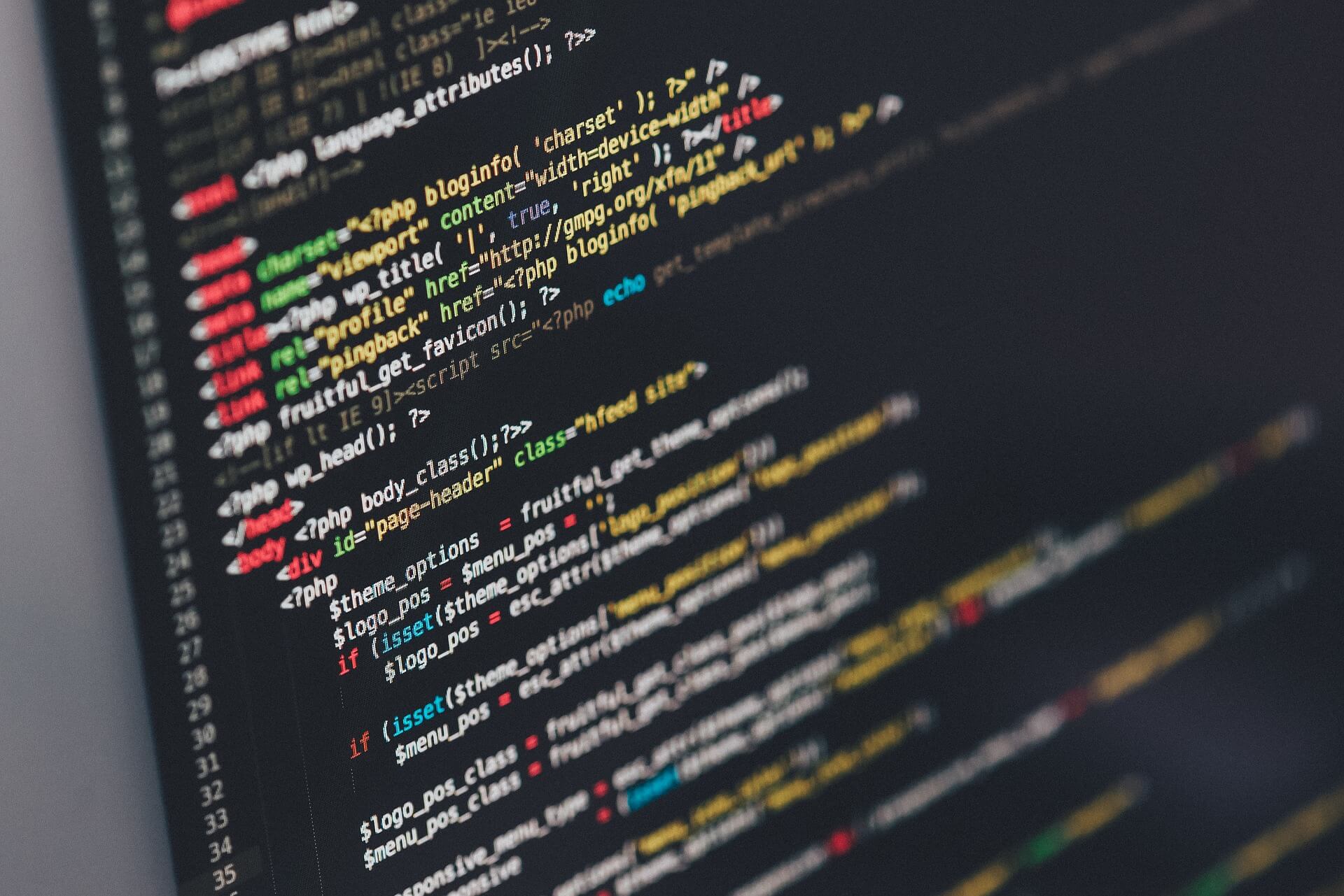 The source code of a website in many different font colours.